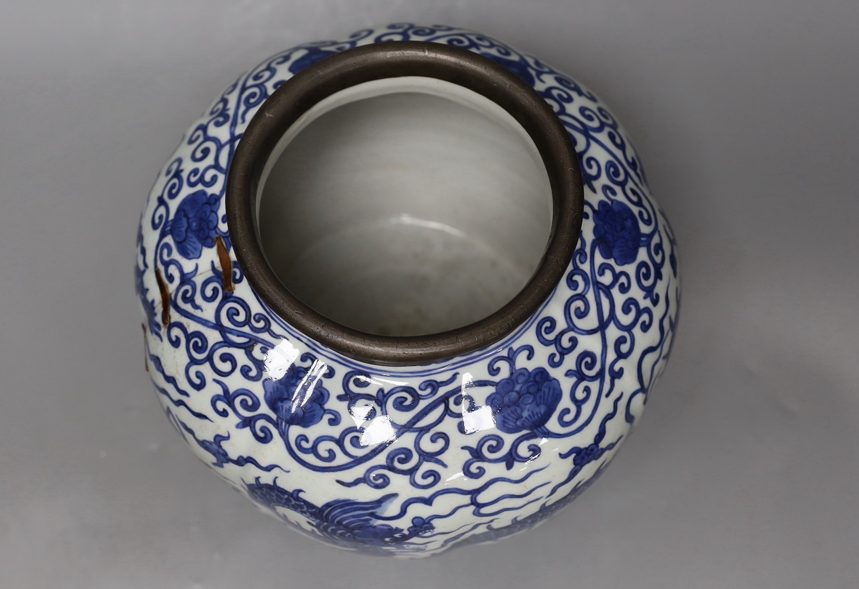 A Chinese blue and white ‘dragon jar, Wanli mark and possibly of the period, 23 cm high